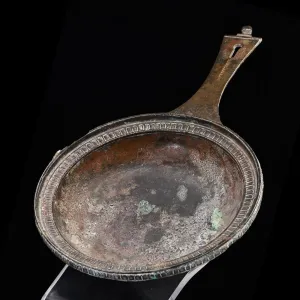 A Roman Military bronze Skillet with maker mark of Publius Cipius Polybius, Flavian Period (65-85 CE)