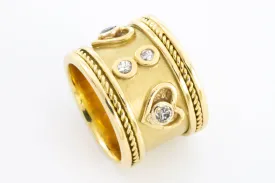 An 18 carat gold Elizabeth Gage style ring with diamonds